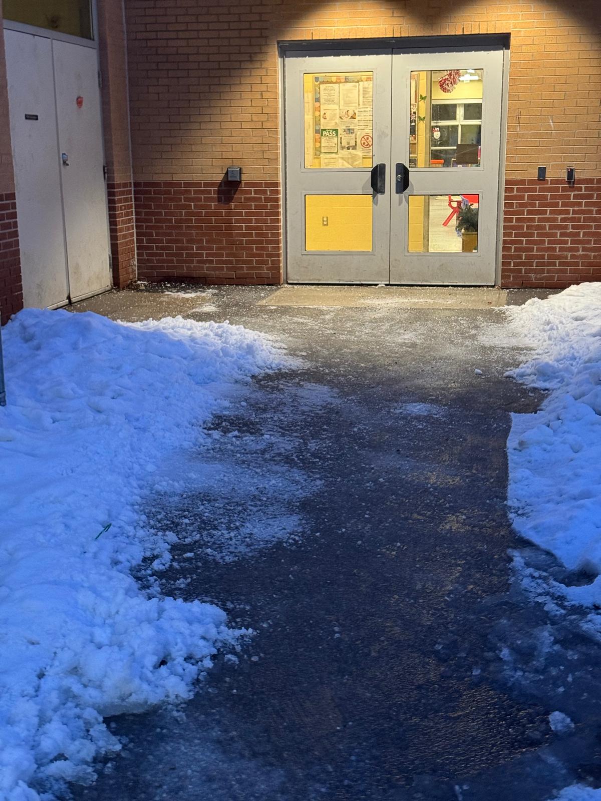 Cleared winter approach with residual snow banks